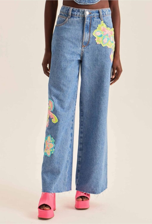 Calças de ganga wide leg com aplicações