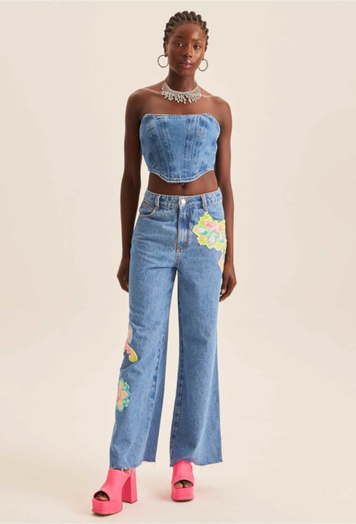 Calças de ganga wide leg com aplicações